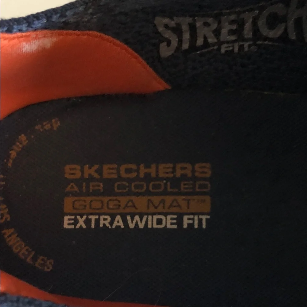 Skechers Slip-On GoWalk Men’s Knit sneakers in Navy with Orange Trim